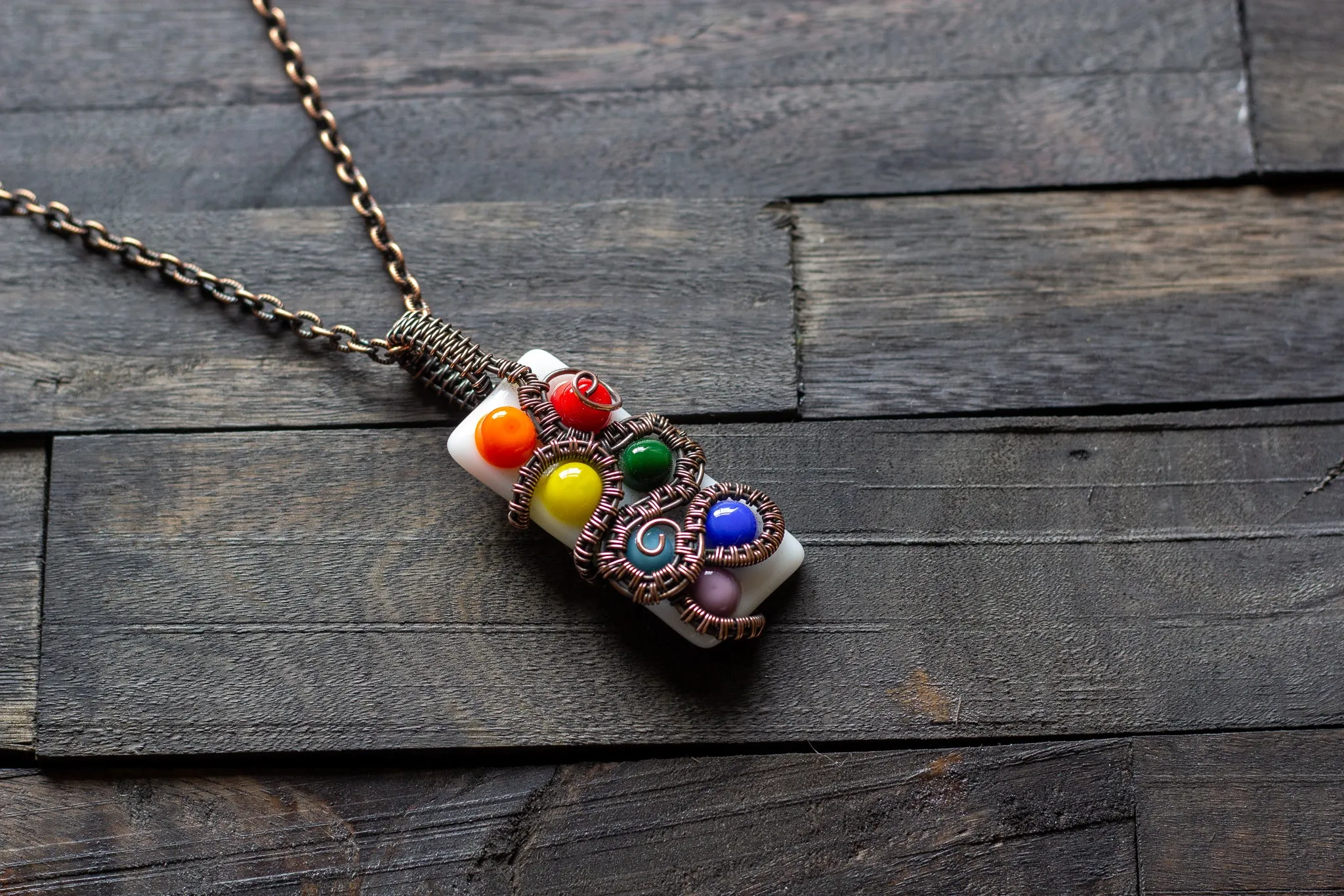 Chakra-Inspired Fused Glass Pendant with Copper Wire Wrapping