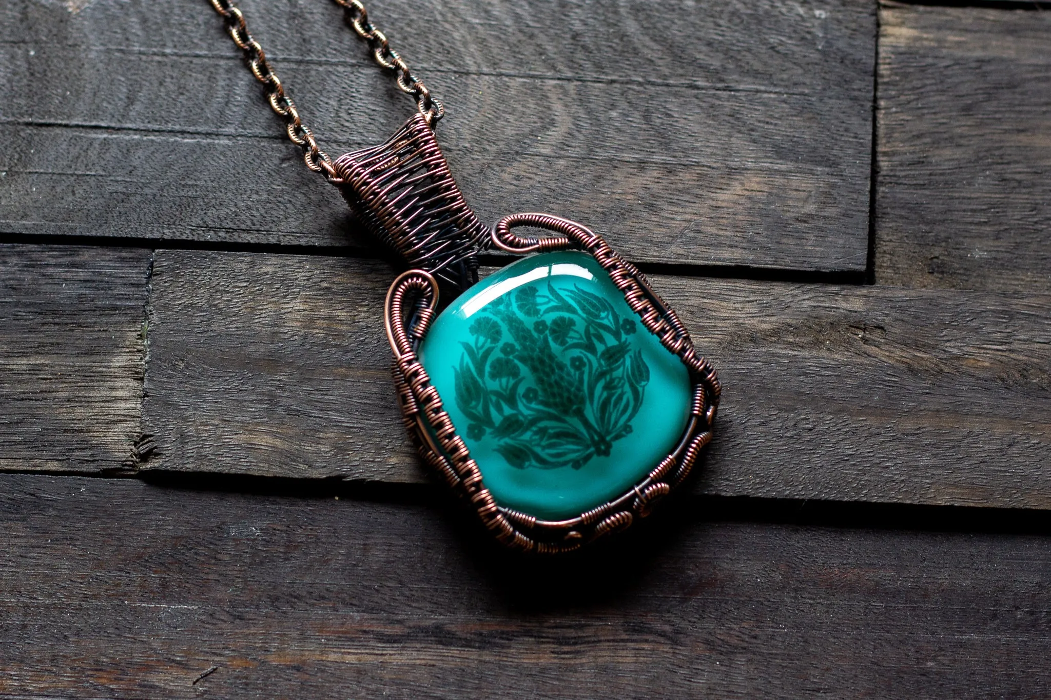 Copper Wire Wrapped Pendant with Stylized Flowers on Teal Fused Glass