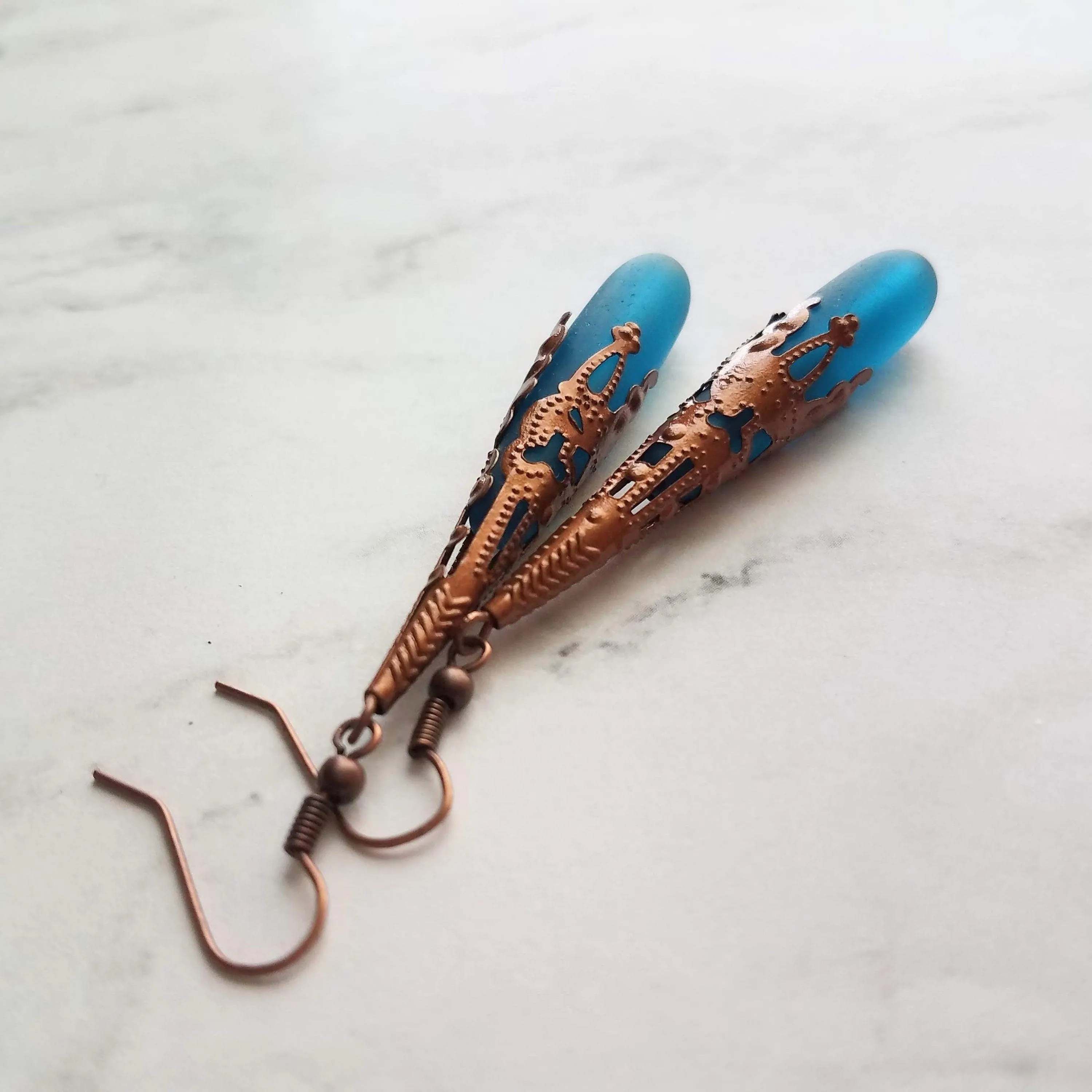 Long Copper Sea Glass Earrings - frosted elongated narrow teal blue teardrop in ornate lacy filigree oxidized antiqued thin cone wrap 3 inch