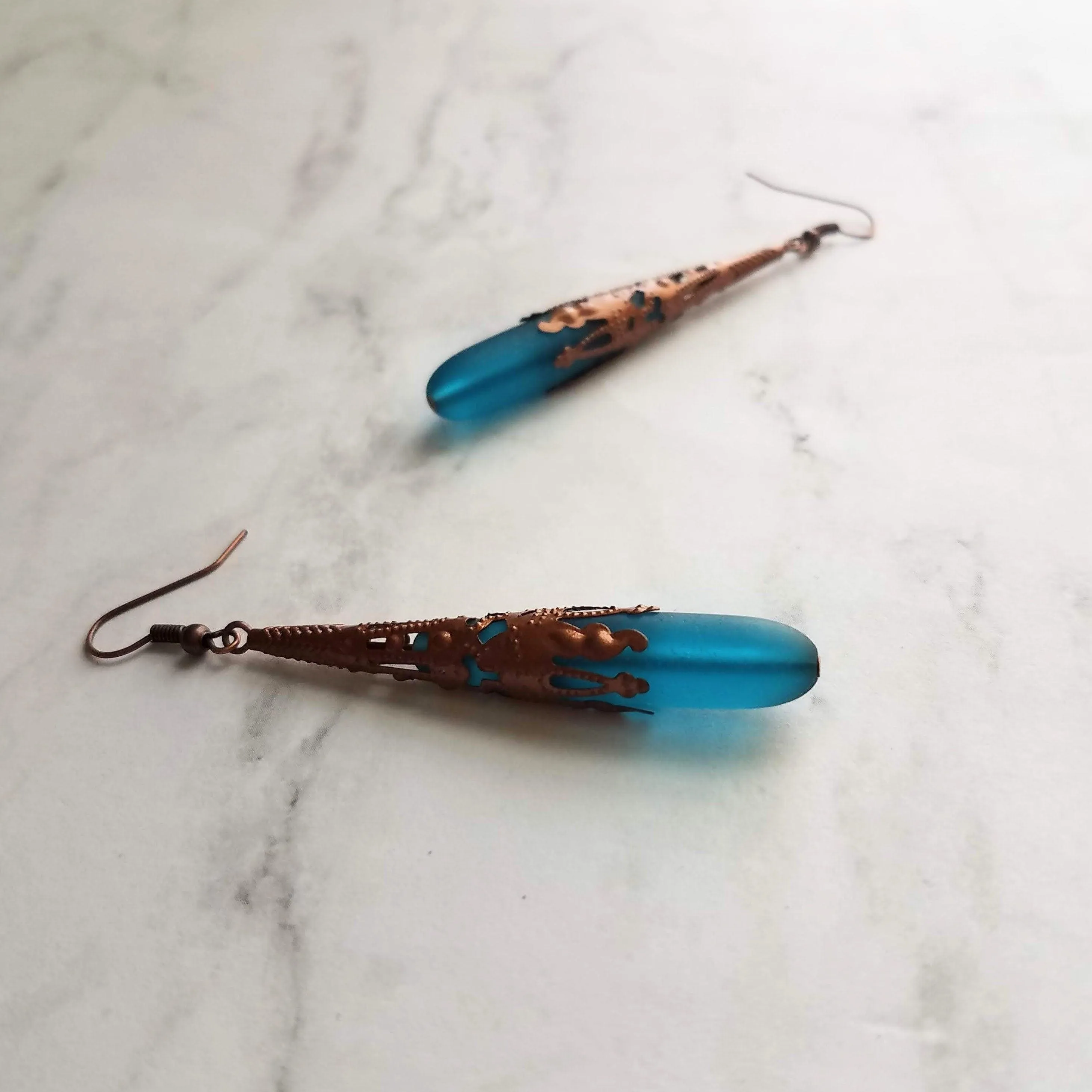 Long Copper Sea Glass Earrings - frosted elongated narrow teal blue teardrop in ornate lacy filigree oxidized antiqued thin cone wrap 3 inch