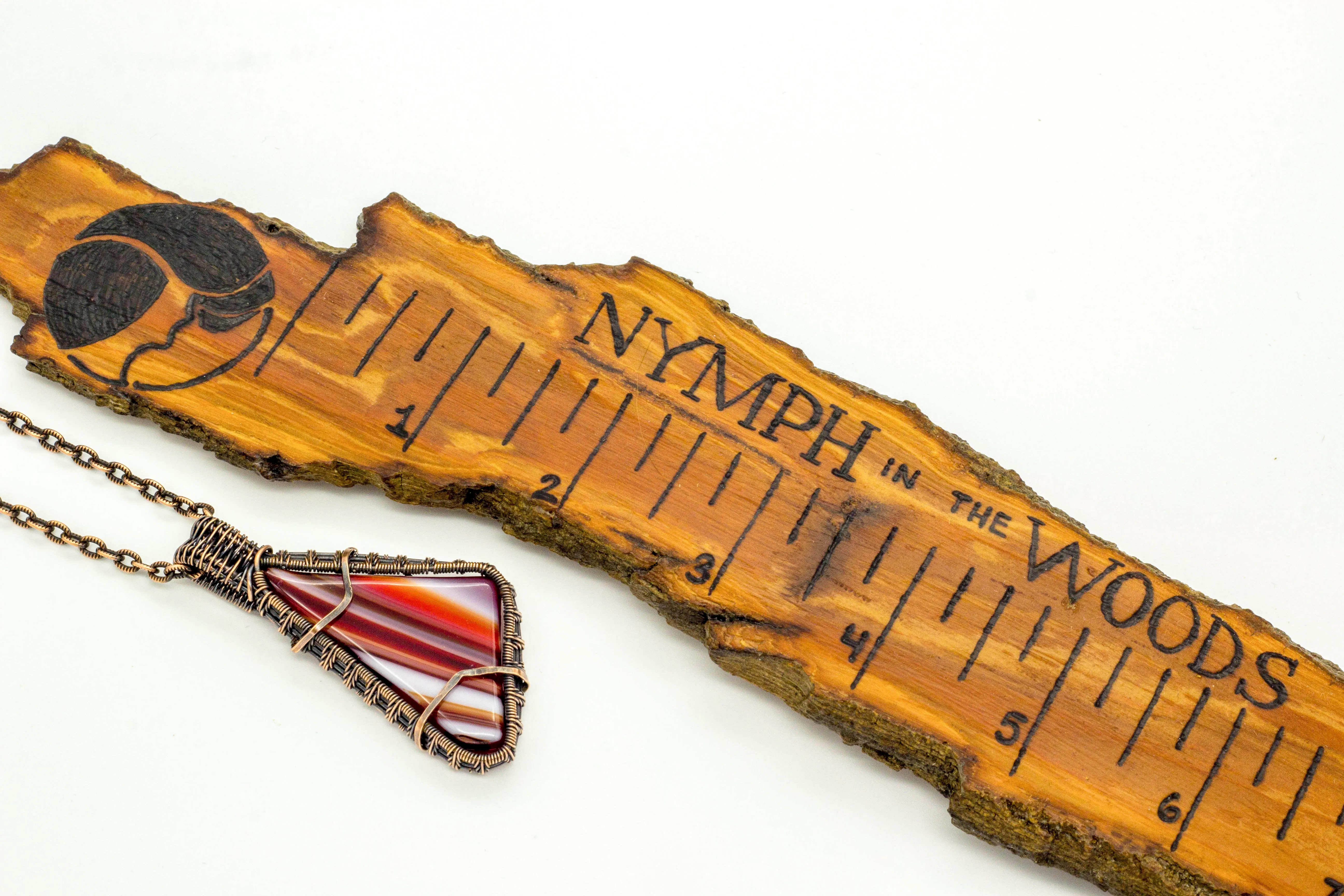 Streaked Red and White Fused Glass Pendant with Copper Wire Wrapping