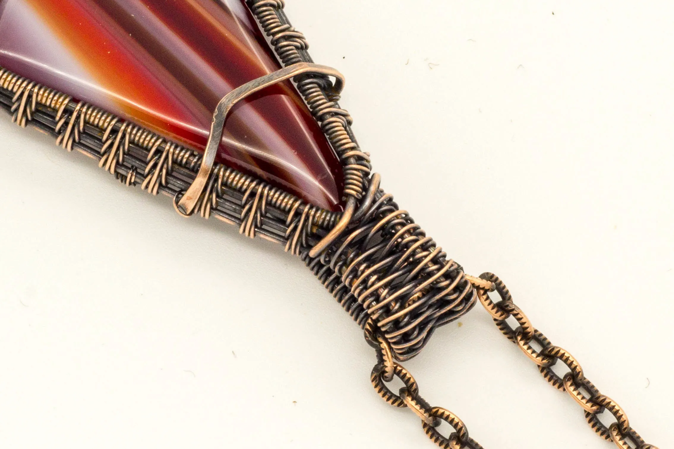 Streaked Red and White Fused Glass Pendant with Copper Wire Wrapping