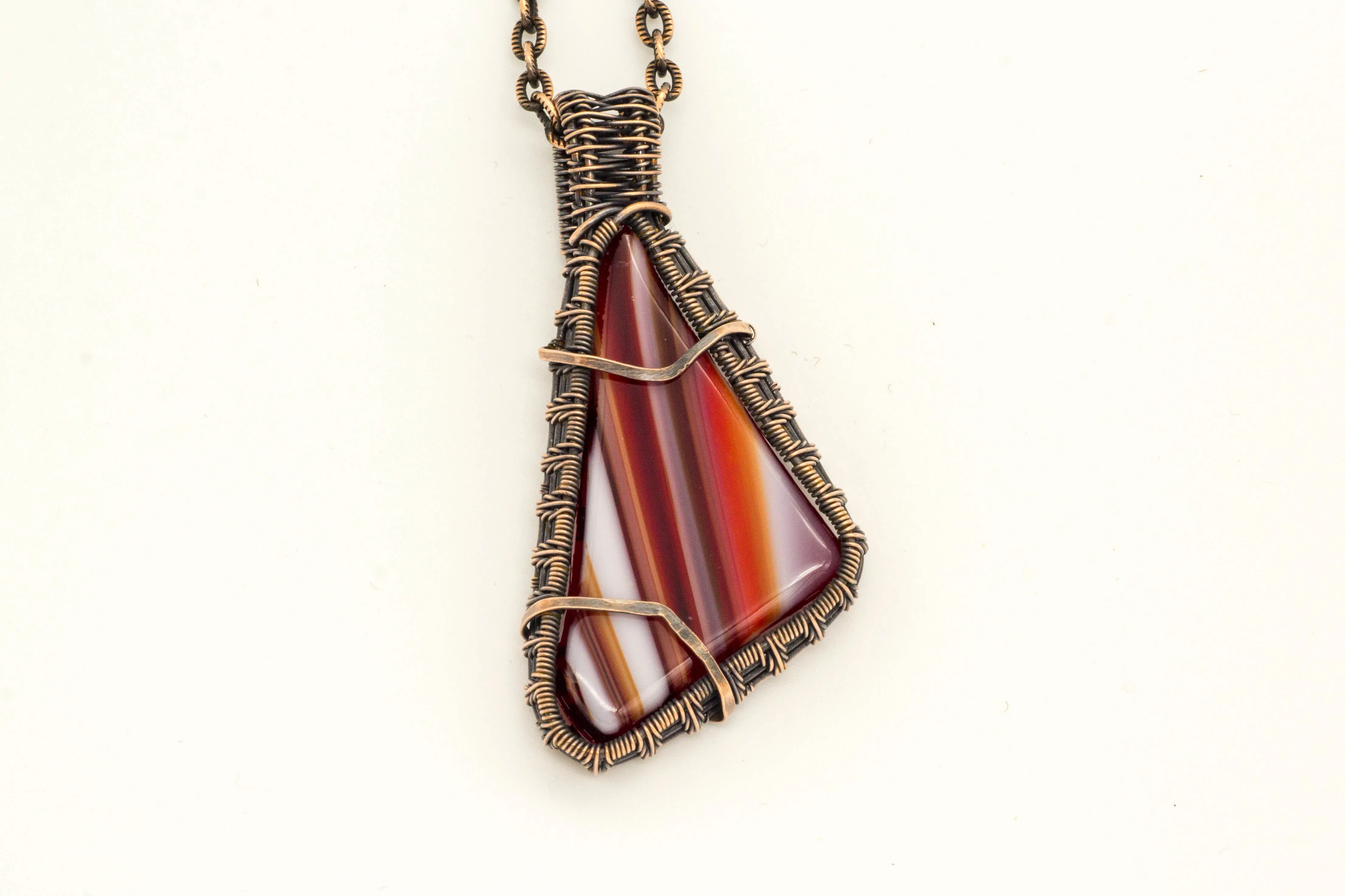 Streaked Red and White Fused Glass Pendant with Copper Wire Wrapping