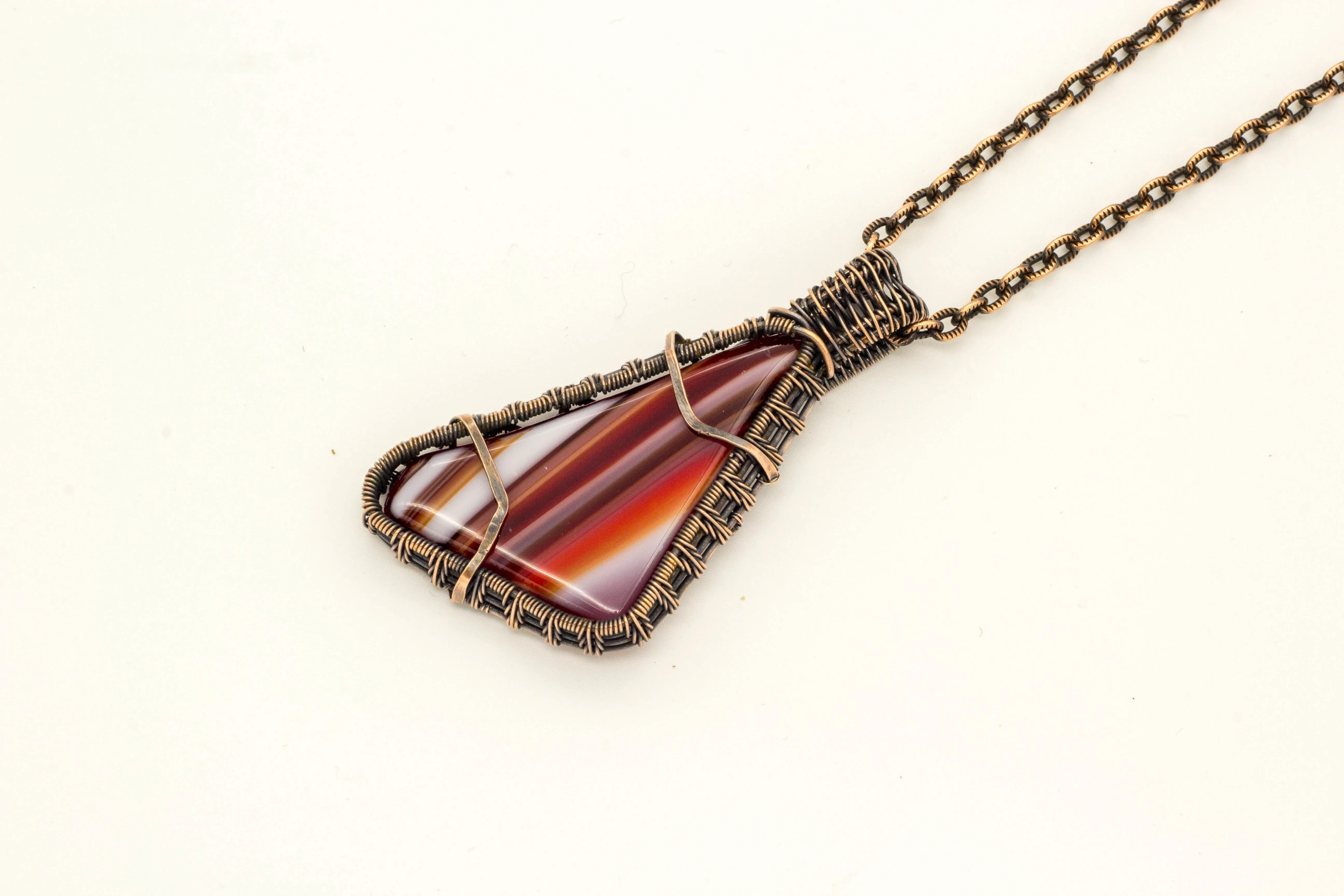 Streaked Red and White Fused Glass Pendant with Copper Wire Wrapping