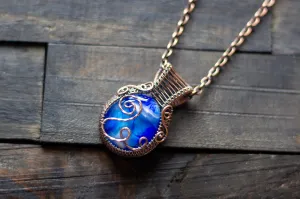 Swirls of Blue Fused Glass and Copper Wire Pendant