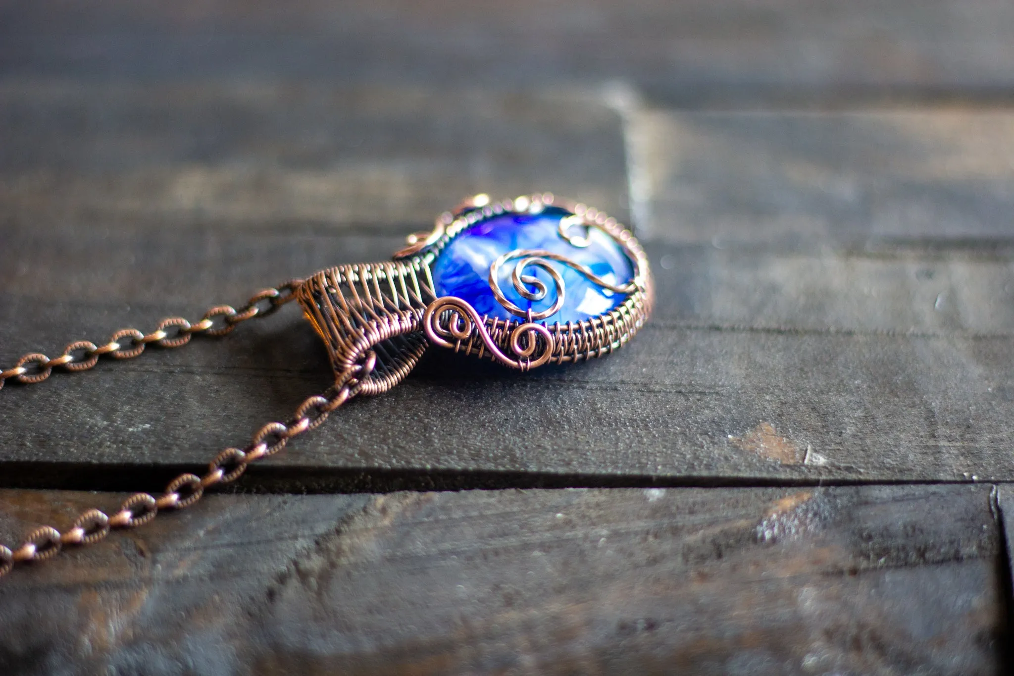 Swirls of Blue Fused Glass and Copper Wire Pendant