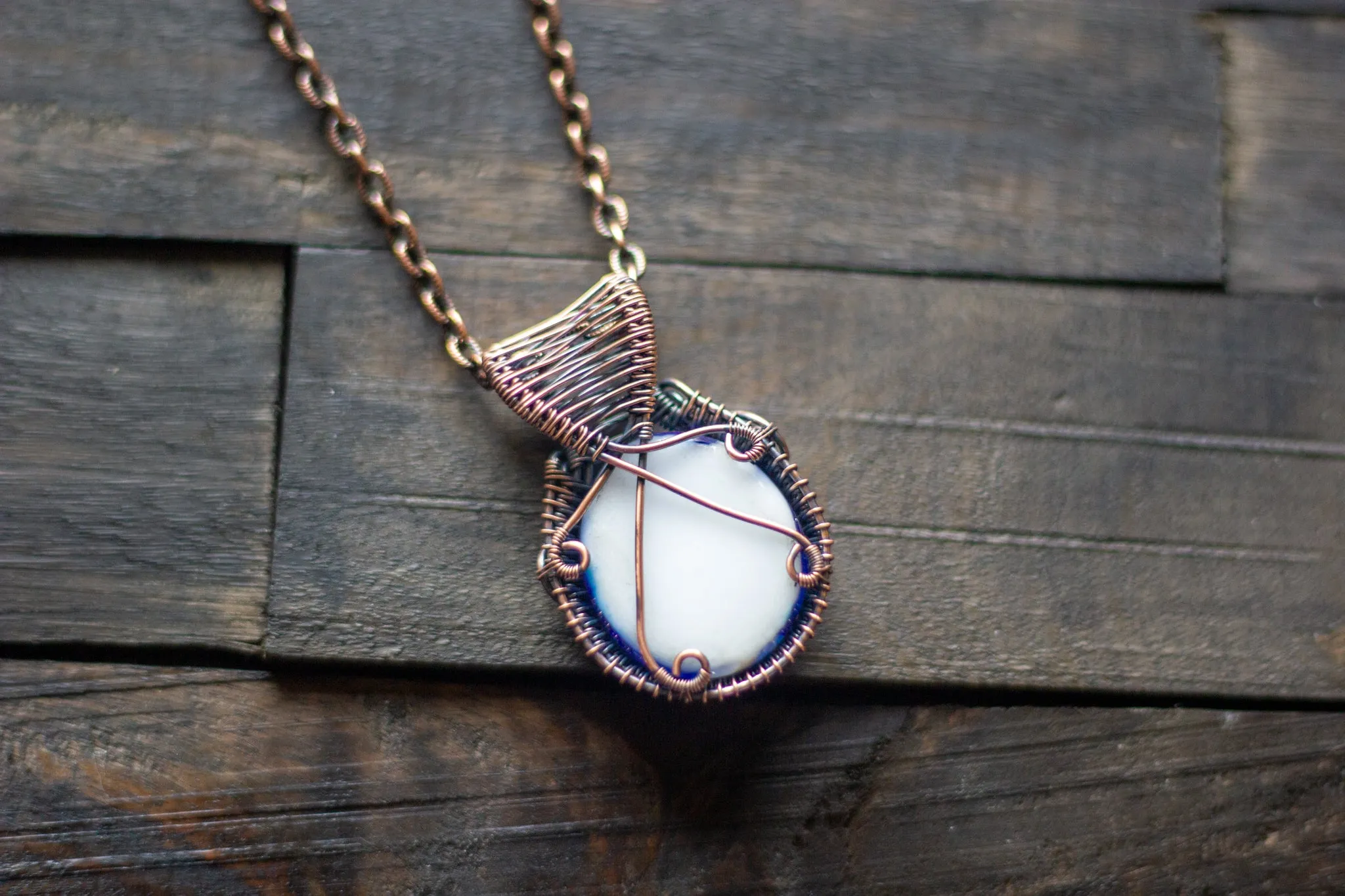 Swirls of Blue Fused Glass and Copper Wire Pendant