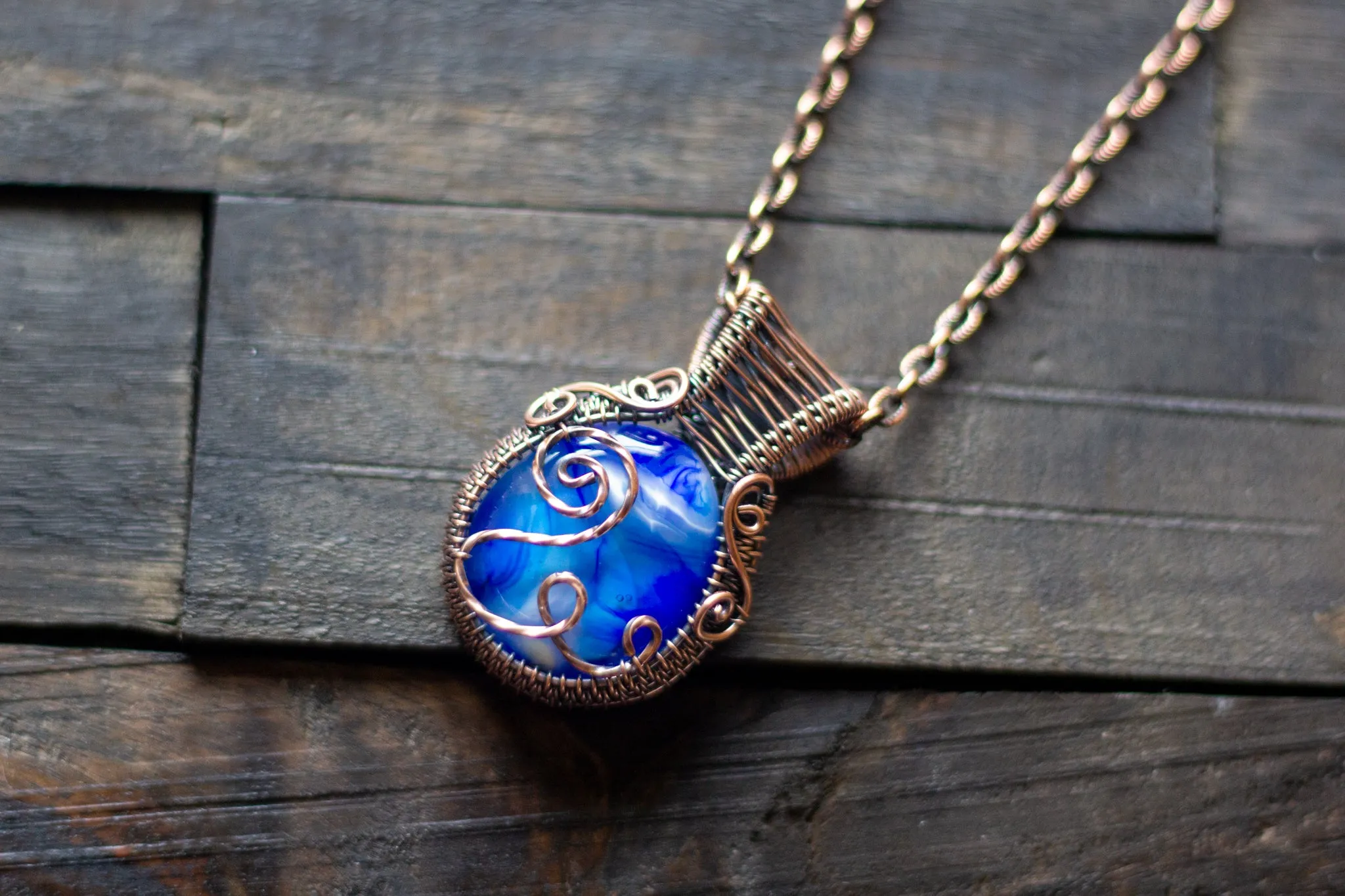 Swirls of Blue Fused Glass and Copper Wire Pendant
