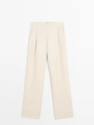 Trousers with dart detail