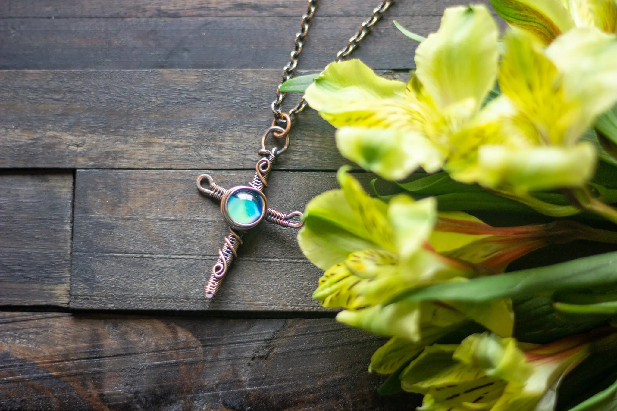 Woven Copper Cross with Light Blue Fused Glass Accent